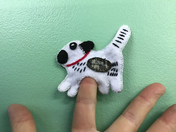 Finger puppets.  Dogs